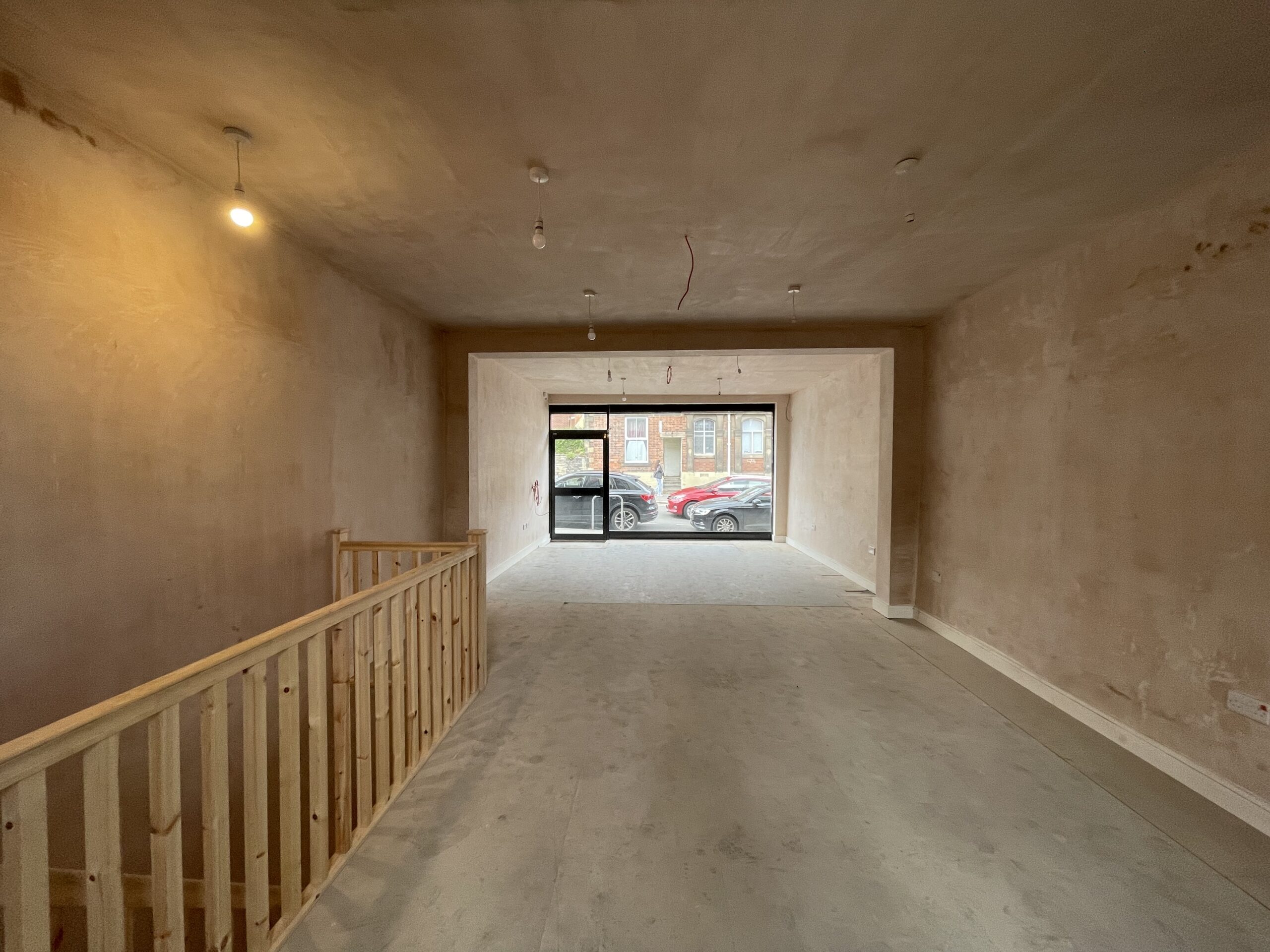 The Burrito Picante unit before the fit out, stripped back to plaster and looking out towards the shopfront