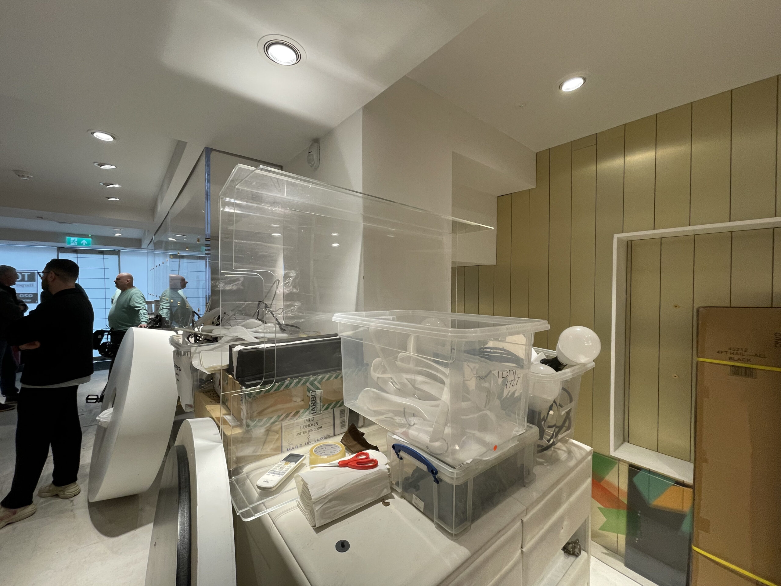 The Mallet retail unit during the strip out, with the counter under protective sheeting