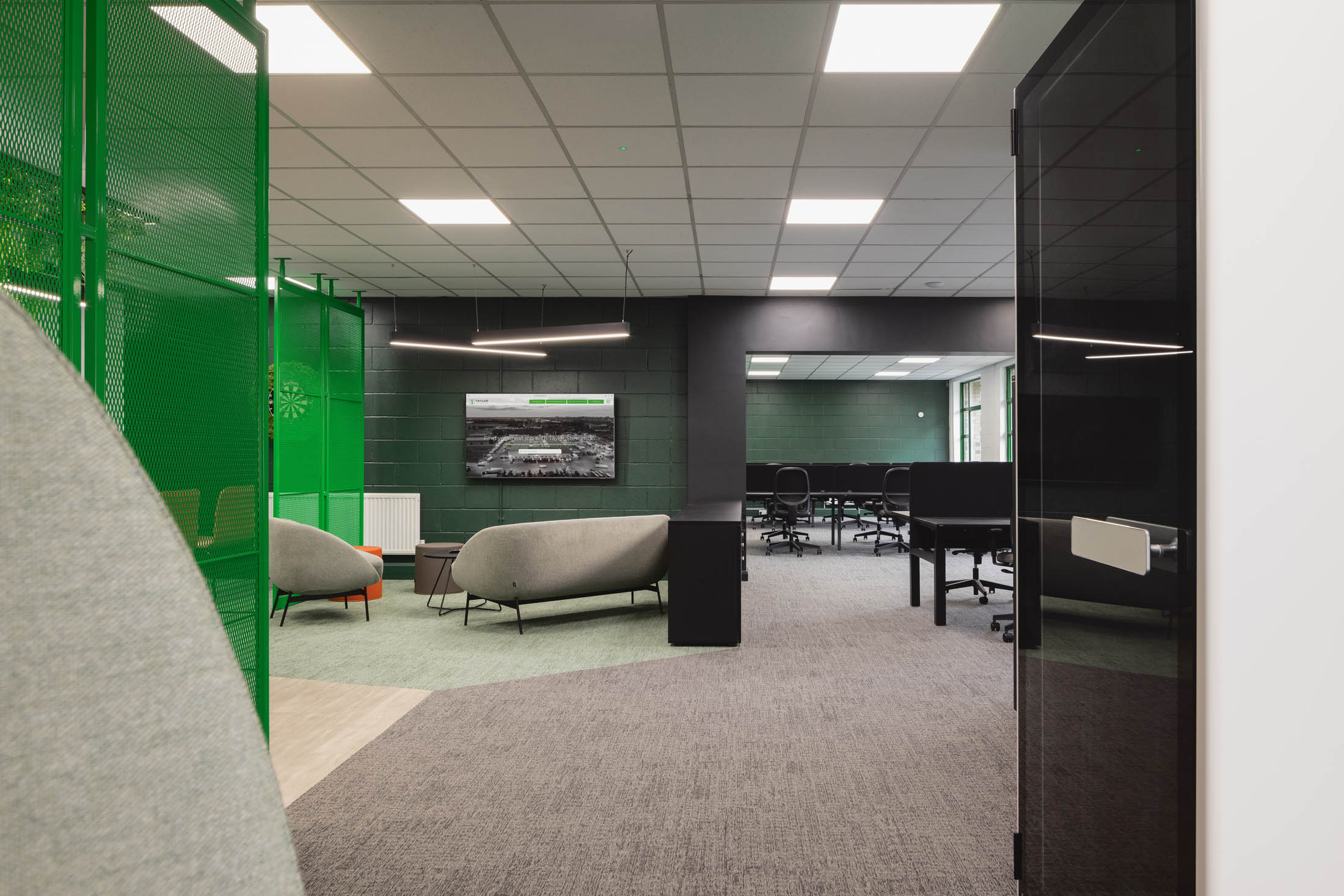 Colour-drenched interior of the refurbished executive box