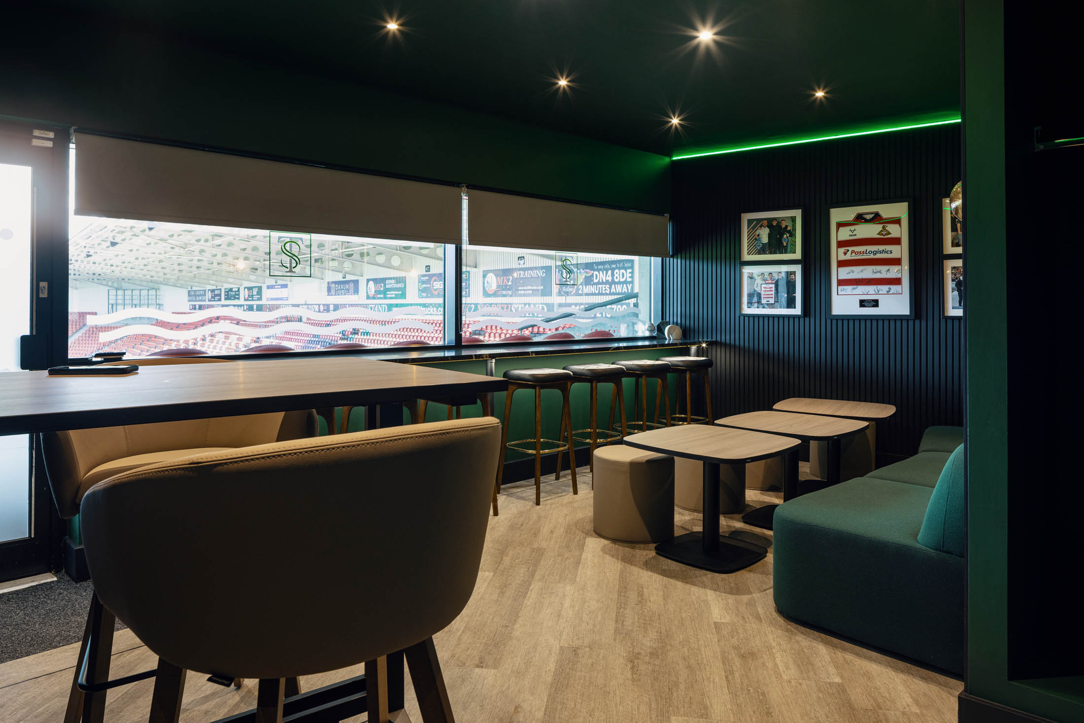 Colour-drenched interior of the refurbished executive box