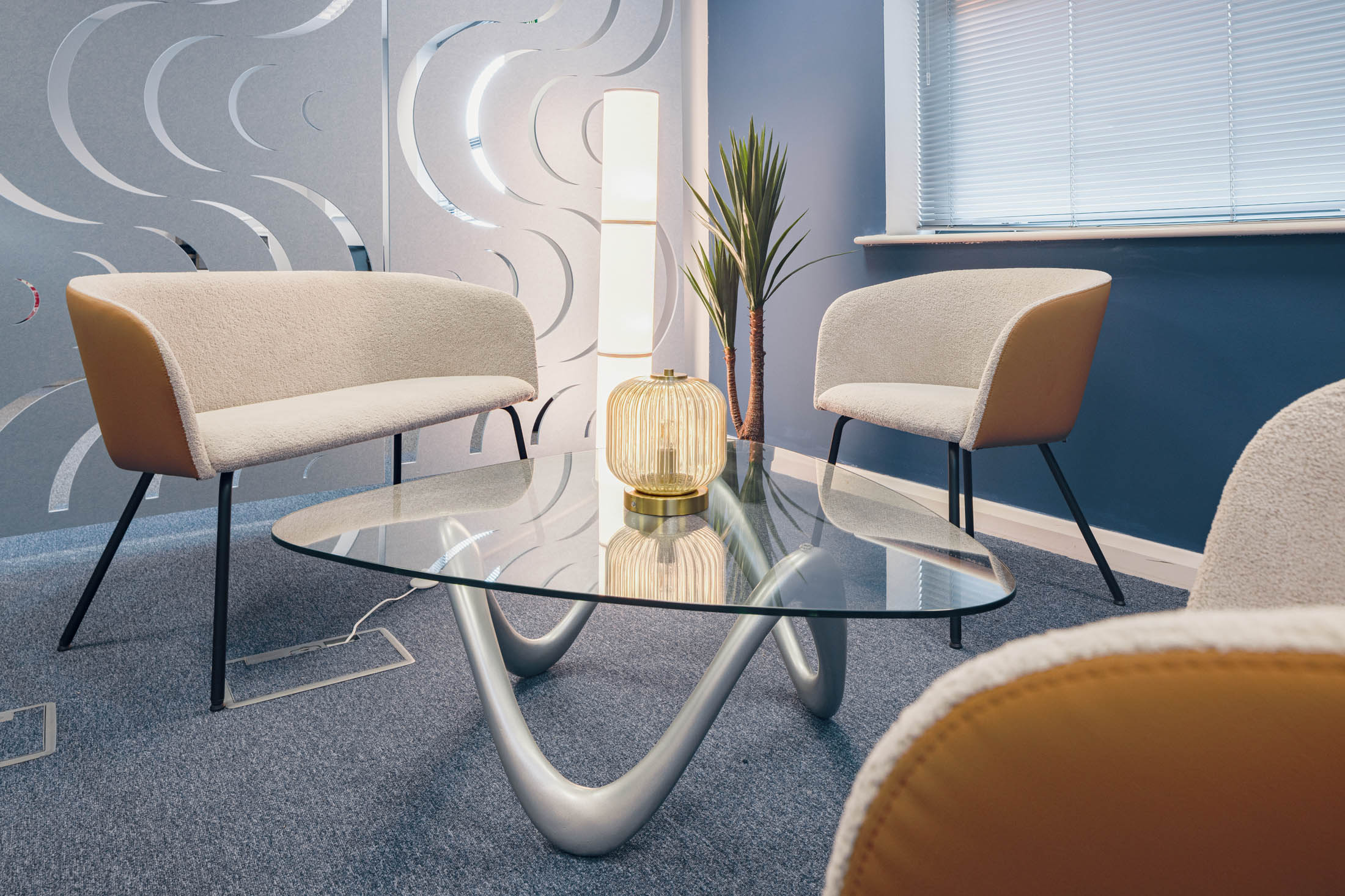 Soft seating area with patterned feature wall