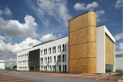 The District Four Design head office, a modern building with timber clad stair core